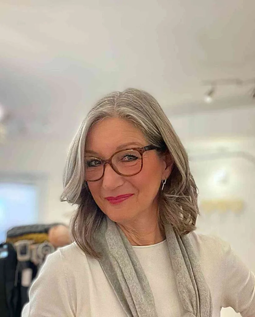 Stunning Off-Center Part on a Shoulder-Length Bob for Women Over 60 with Glasses
