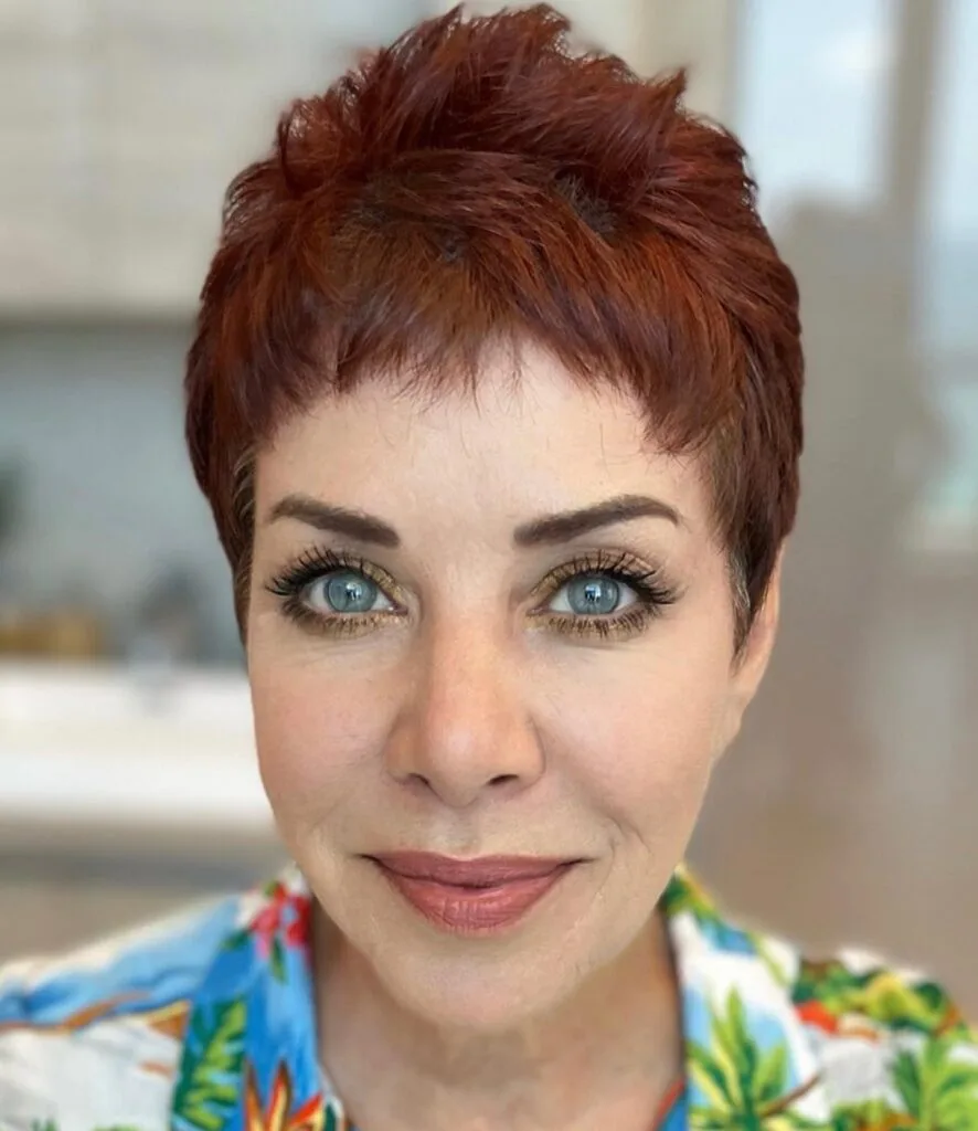 Stylish Copper Spiky Pixie Cut with Textured Layers