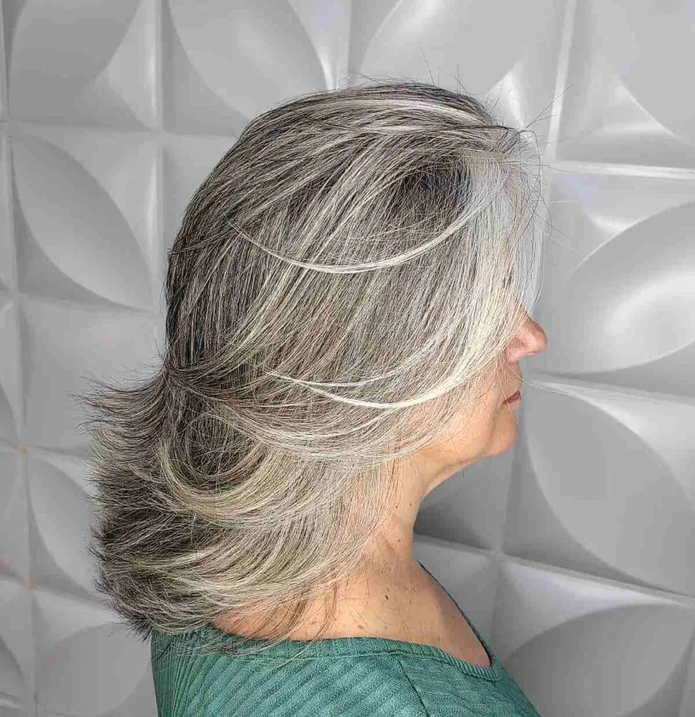 Stylish Feathered Lob with Soft Ends for Women Over 50 with Thick Hair