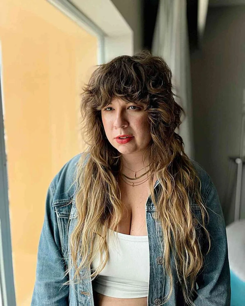Textured Long Shag with Wavy Bangs on Women over 50 and up