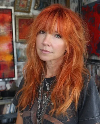 Vibrant Long Layers with Face-Framing Bangs