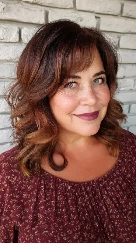 Warm Auburn Waves with Soft Bangs