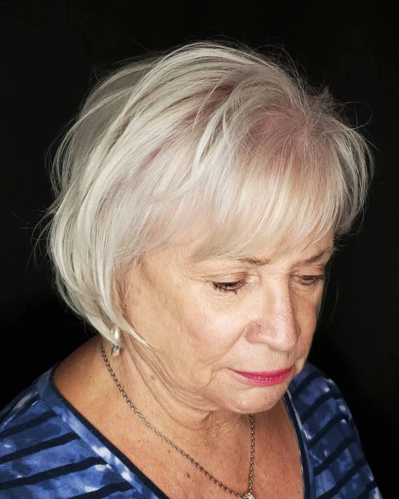 Youthful short bob with bangs for senior women with finer hair