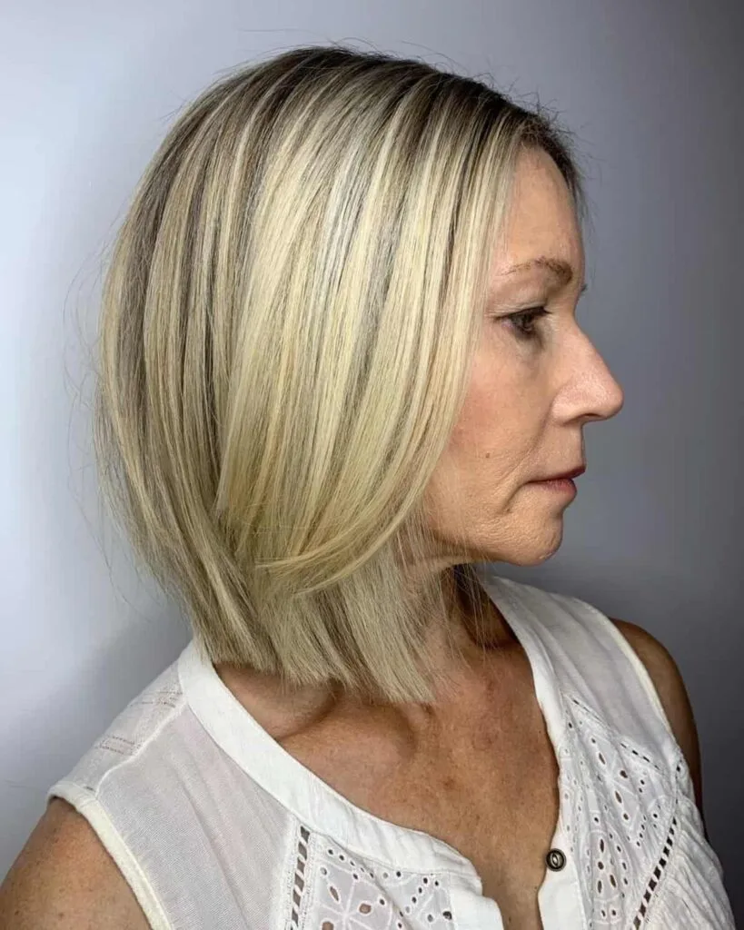 blonde balayage lob for a woman over 50