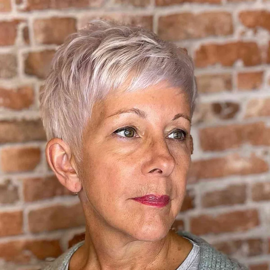 Charming Pixie with Stylish Side-Swept Bangs for 60-Year-Old Ladies