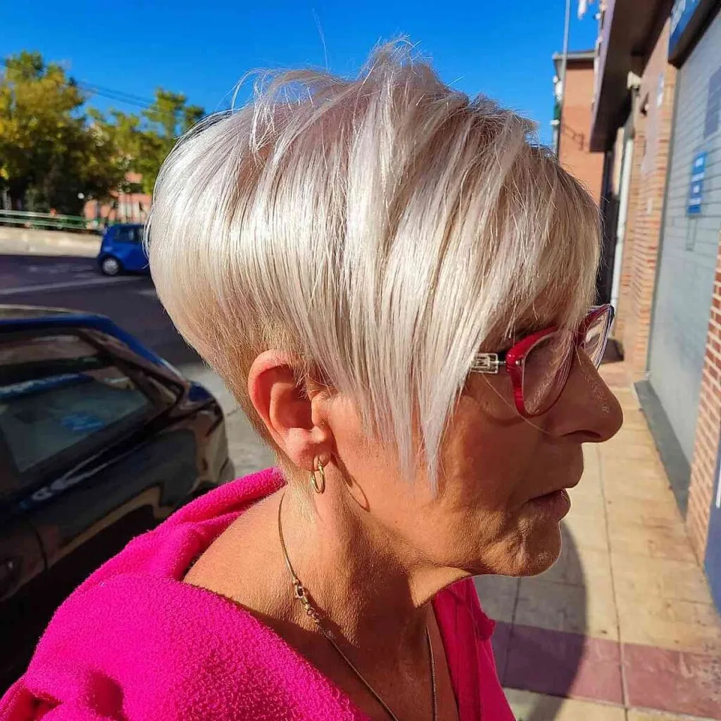 Chic Platinum Asymmetric Pixie Cut for a 60-Year-Old