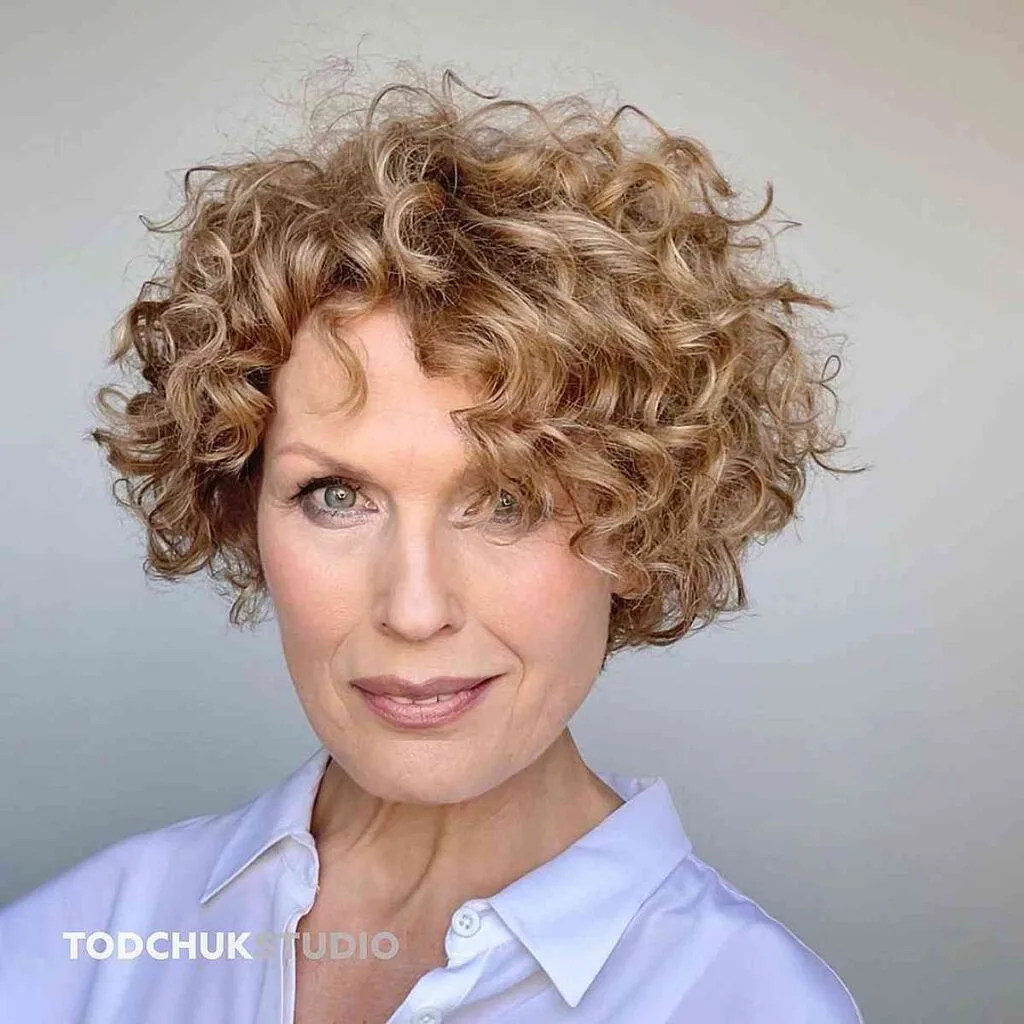 Chic short curly bob hairstyle for women over 50