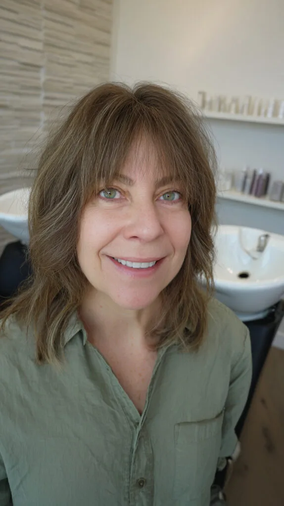 Chic Soft Layers with Wispy Bangs for a Fresh Look