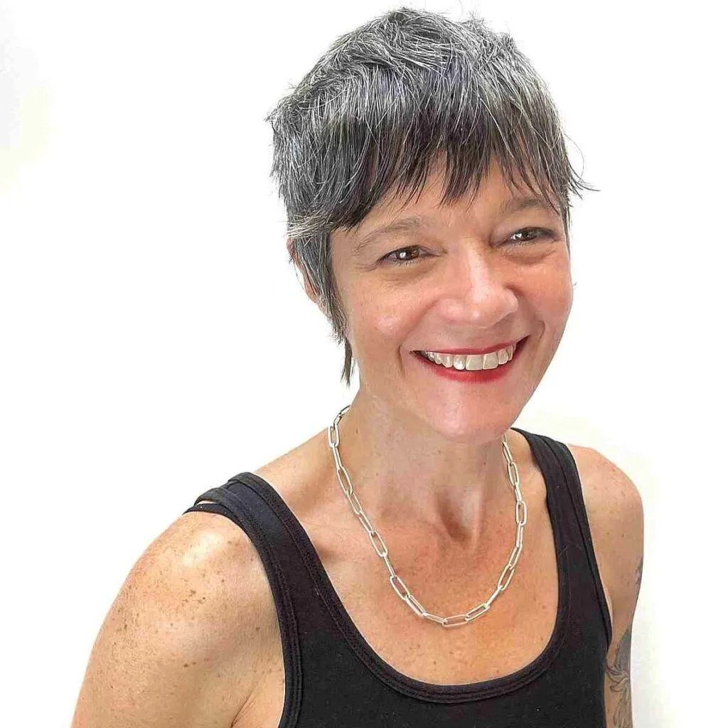 Chic Super Short Pixie with Layered Bangs for 50-Year-Old Ladies