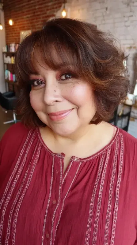 Chic Textured Bob with Romantic Long Bangs