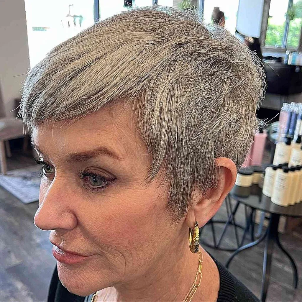 Chic Textured Pixie with Bangs and Sideburns for 60-year-olds