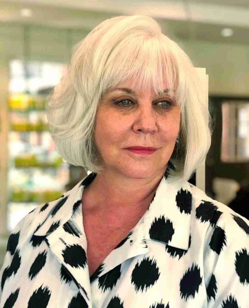 Elegant Chin-Length Bob with Soft Bangs for a 50-Year-Old