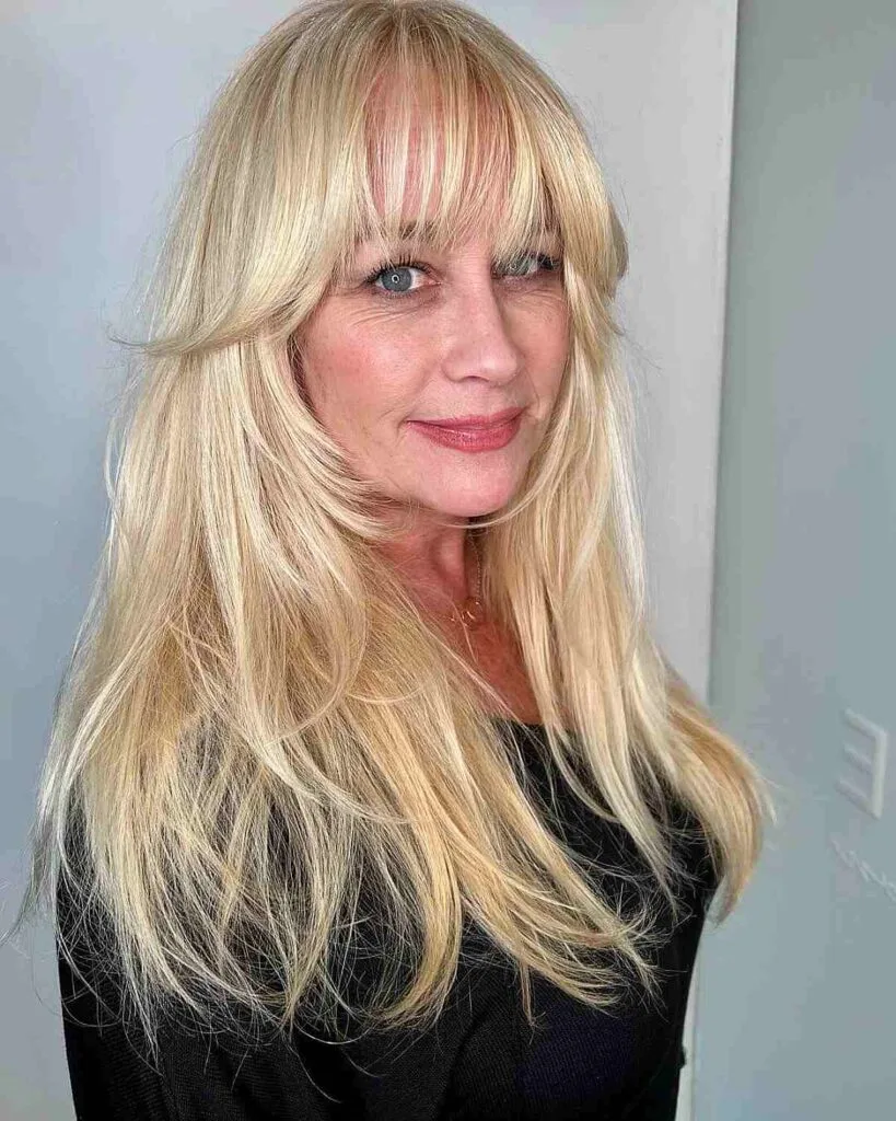 Elegant Long Blonde Hair with Delicate Bangs for Ladies 50 and Up