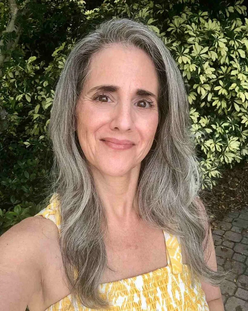 Gentle Layers for Longer Hairstyles for a 50-Year-Old Woman