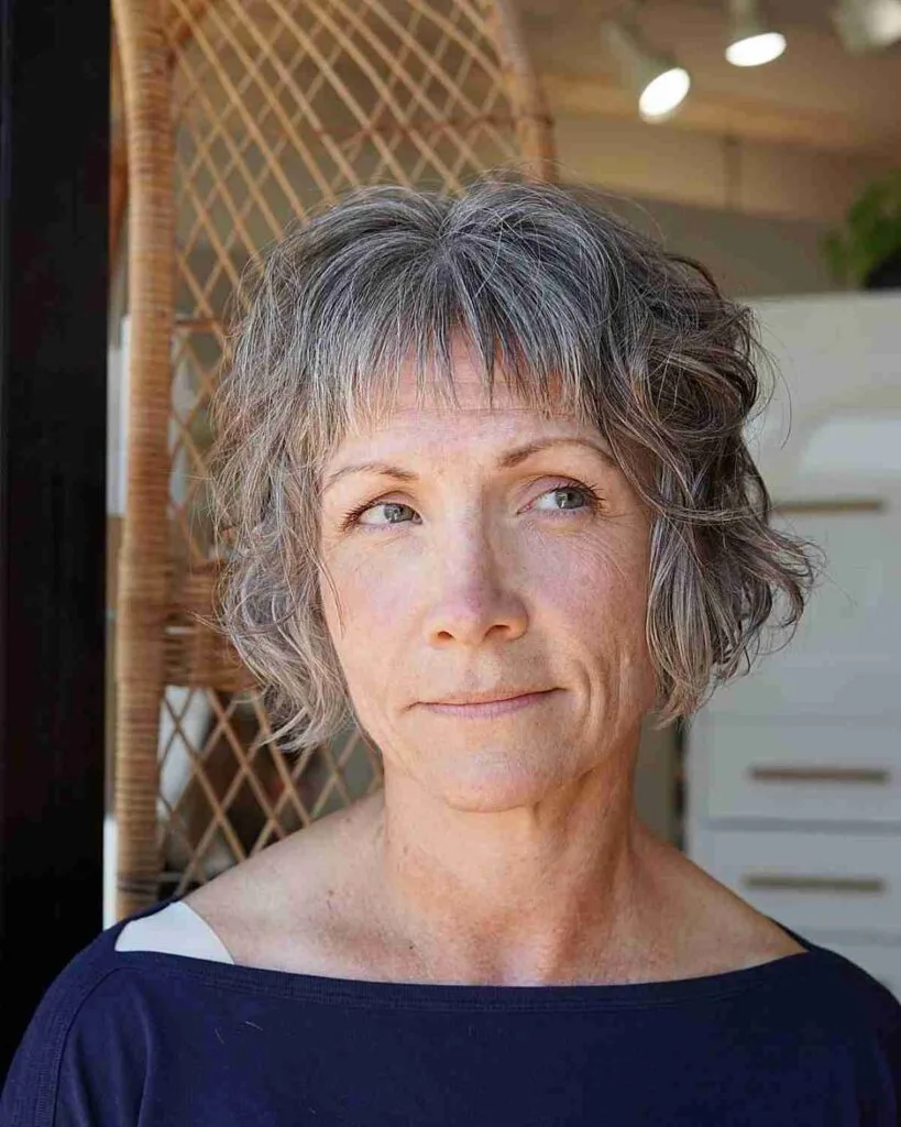 Jaw-Length Shaggy French Bob Featuring Choppy Bangs for Women over Fifty