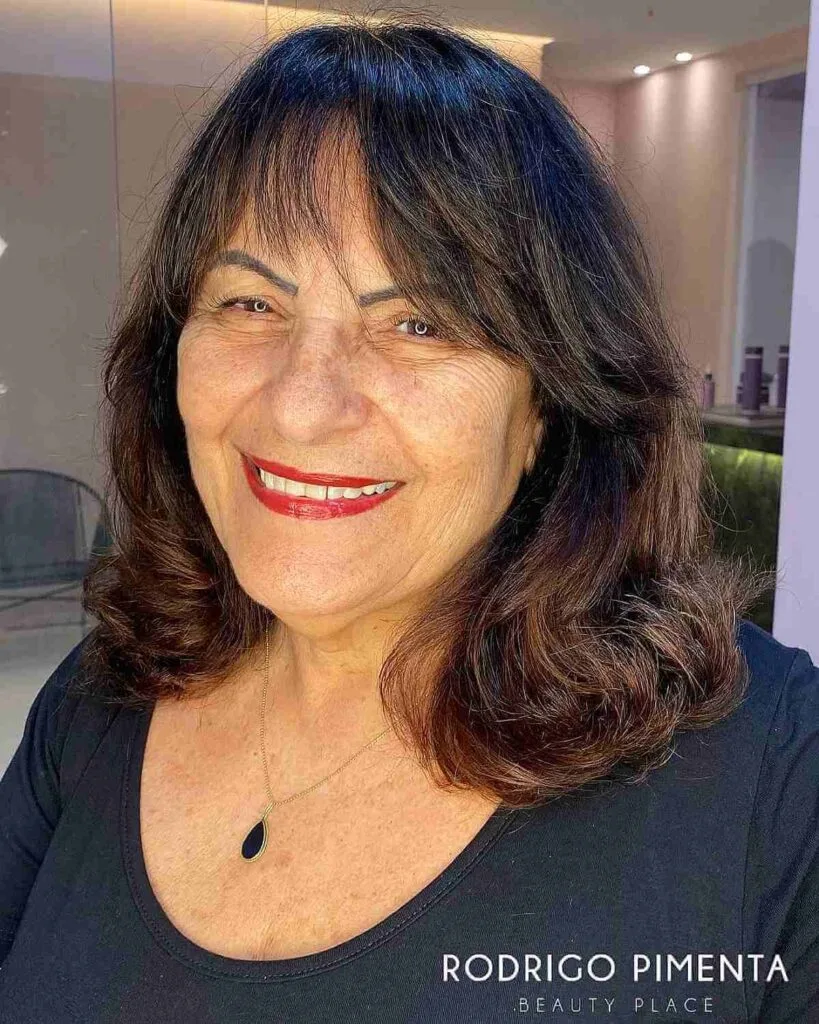 Lightweight Medium-Length Hairstyle with Gentle Bangs for Women Over Fifty