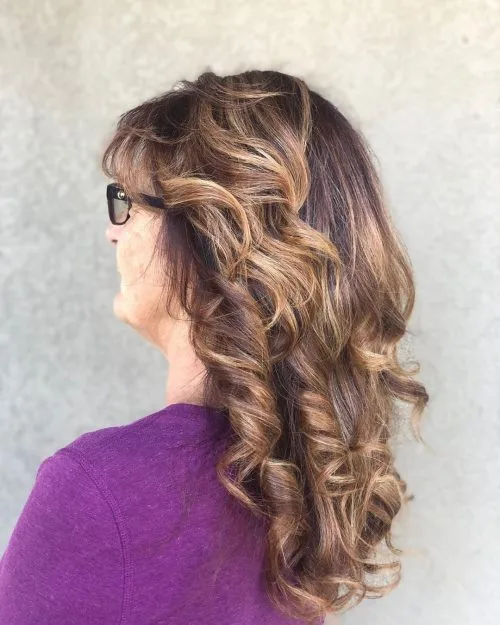 long hairstyles for woman over 50 with glasses