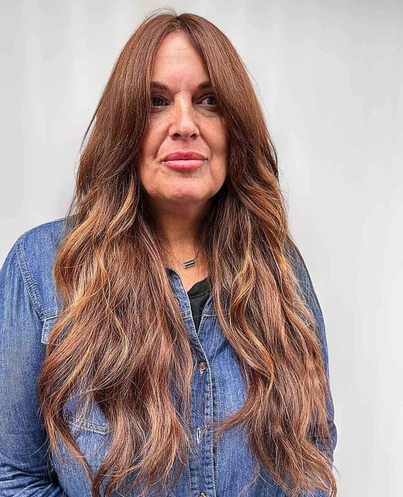 Long Thick Wavy Hairstyle with Brunette Balayage for Women Over 50