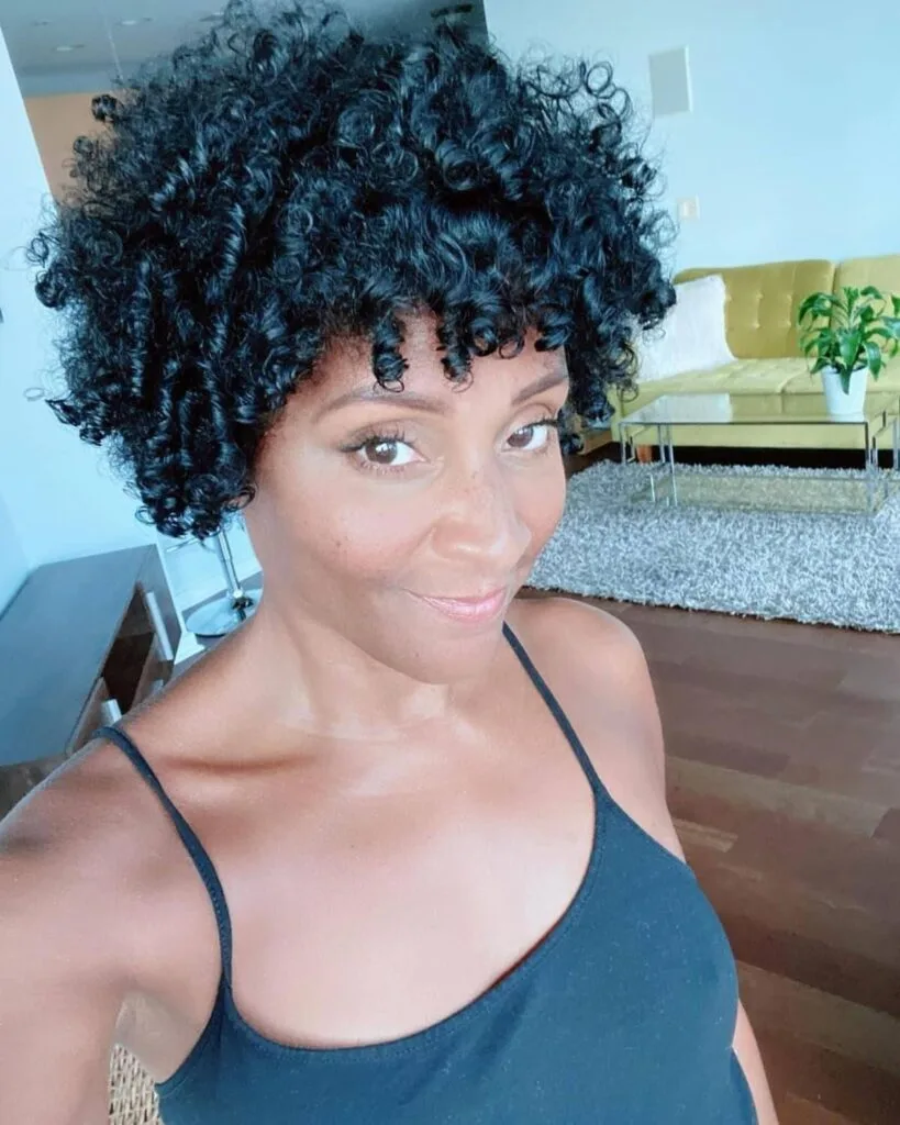 Natural afro for women over 50 with curly hair