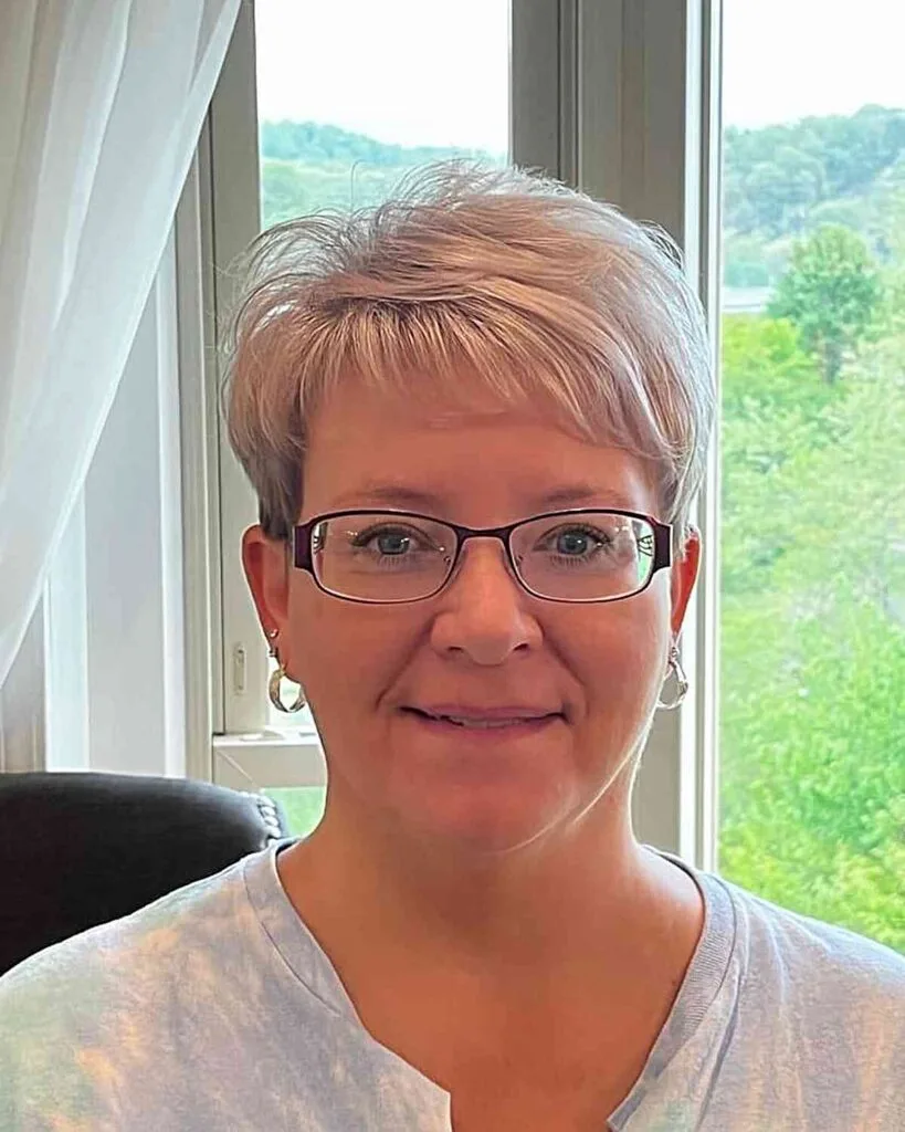 Platinum Pixie with Short Bangs on 50-year-old Ladies with Glasses and Thin Hair