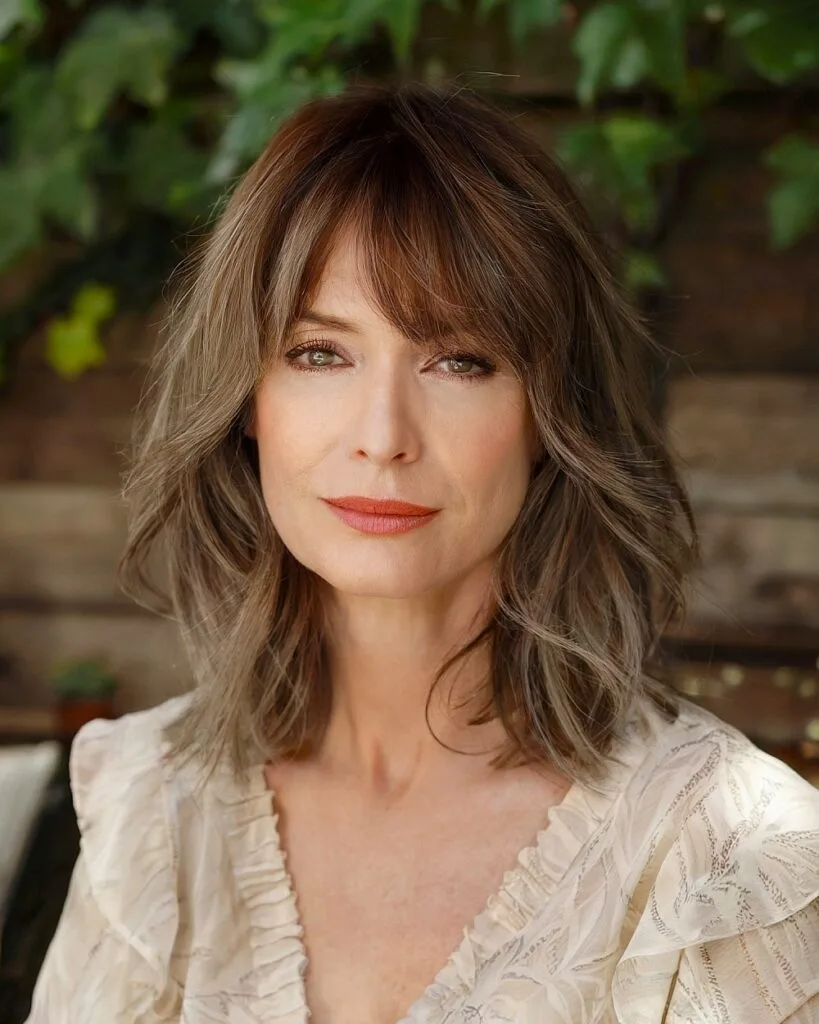 Shaggy long bob with soft face-framing layers for fine hair over 50