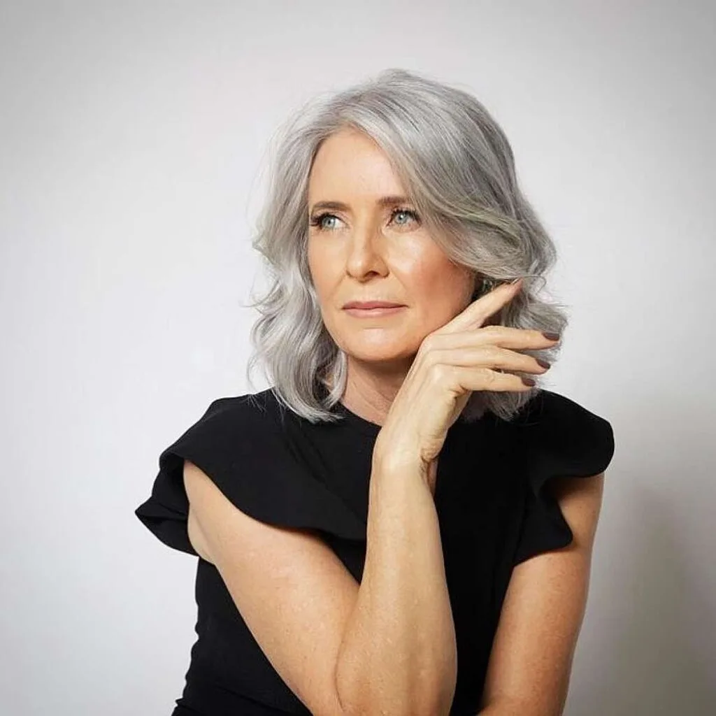 Shoulder-Length Hair with Soft Waves and a Side Part for Women Over Fifty