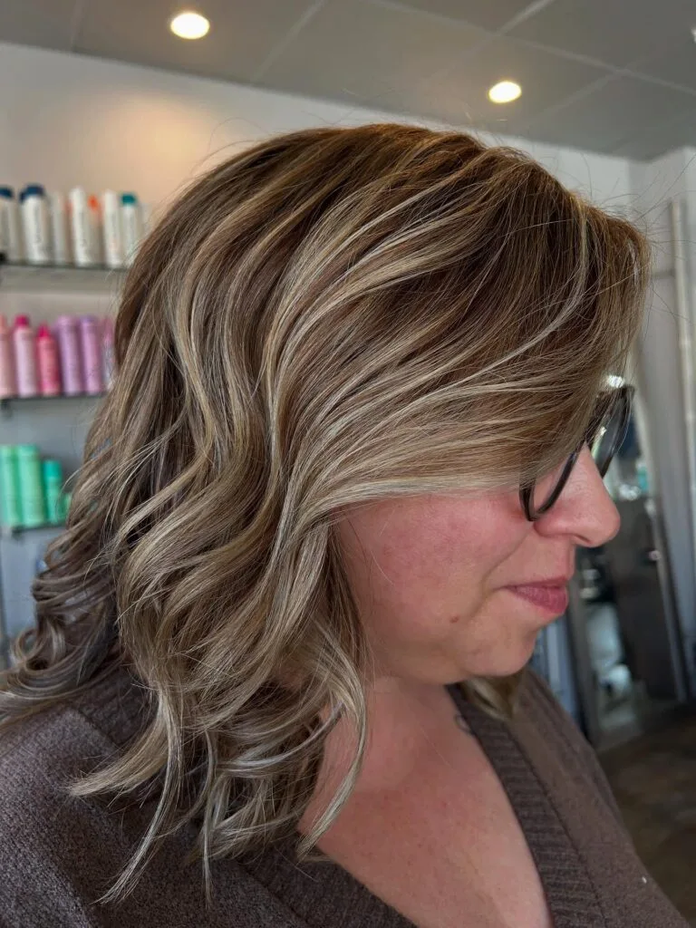 Soft Layered Blonde Waves with Subtle Highlights