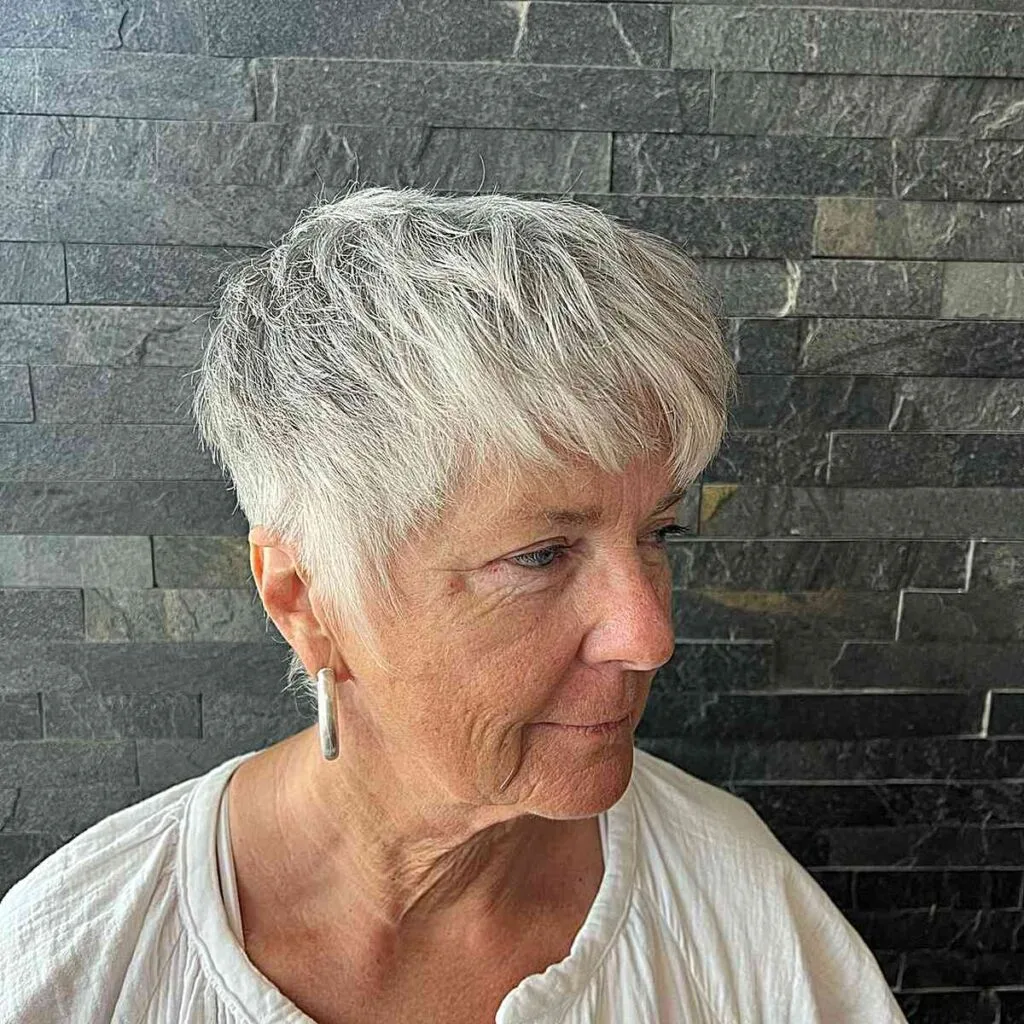 Subtle Silver Gray Wispy Pixie Cut for 60-Year-Olds with short hair