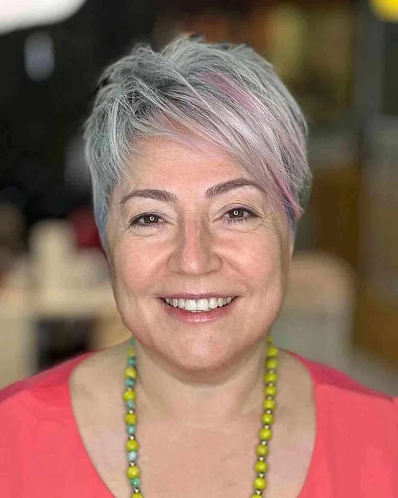 Sweeping Long Pixie with Pink Highlights for Women Aged 50 with a Round Face
