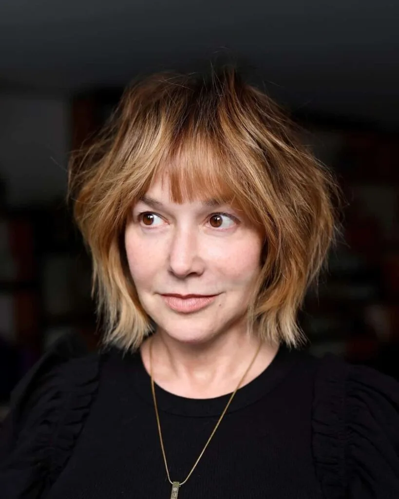 Textured long bob with framing bangs for women over 50