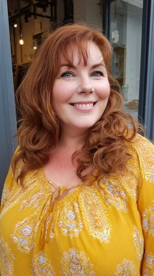 Warm Auburn Voluminous Waves with Subtle Layers